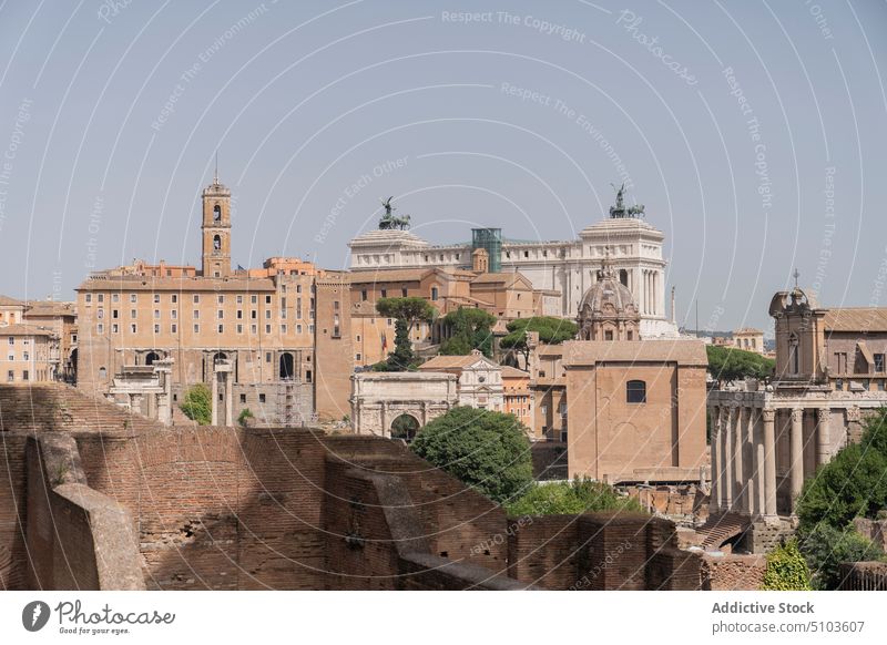 Historic town district in daytime building old historic stone wall gray sky famous street architecture rome italy roman forum ancient landmark heritage culture