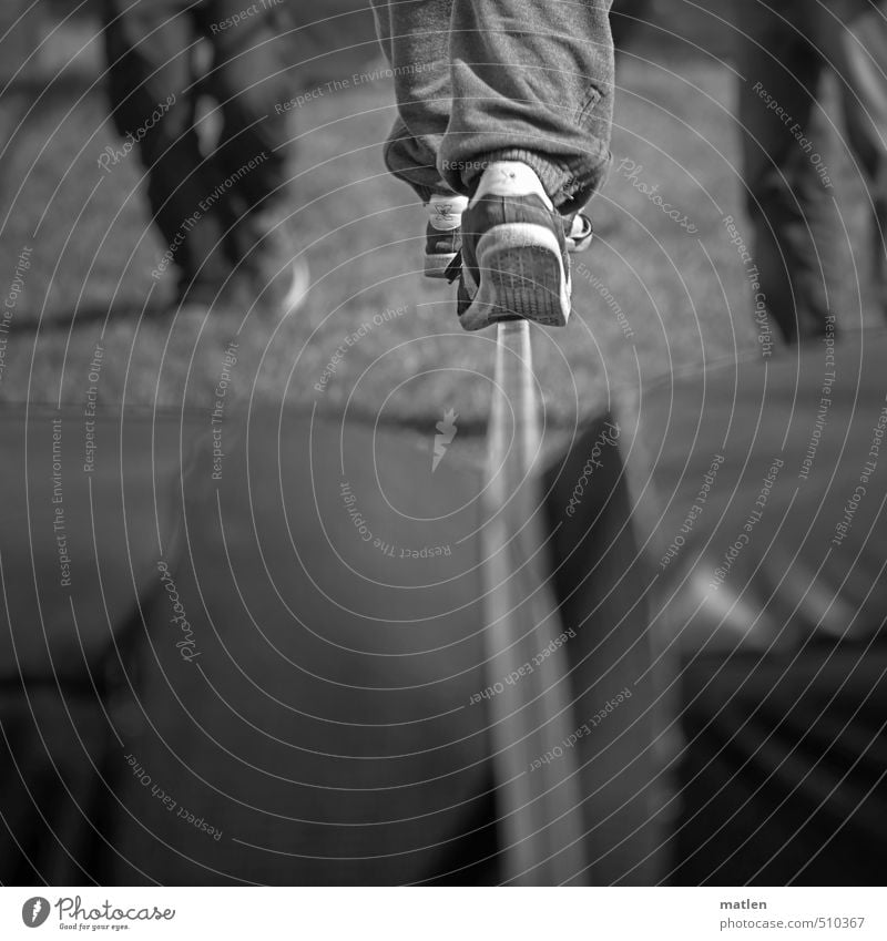 keep track Human being Legs 3 18 - 30 years Youth (Young adults) Adults Cool (slang) balance sneakers tightrope walk Accompany Black & white photo Exterior shot