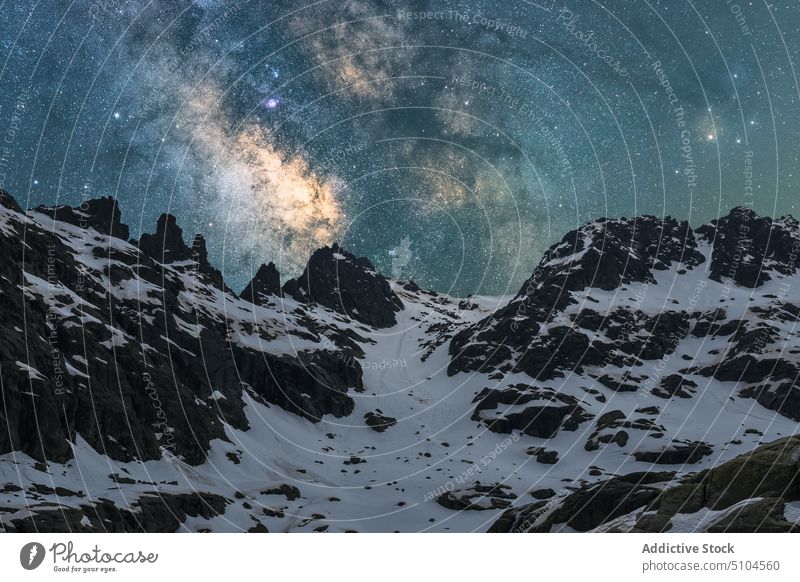 Milky Way in starry sky above snowy mountain at night milky way Sierra de Gredos Avila galaxy universe astronomy cosmos space nature winter highland landscape