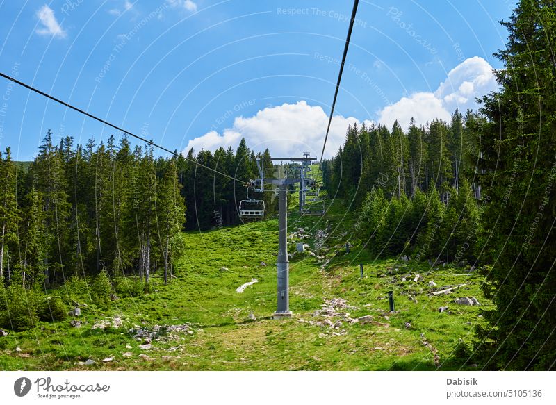 Open cable car line in mountains, Ski lify in resort for tourists ski lift forest karpacz nature funicular hike active background aerial summer poland sniezka