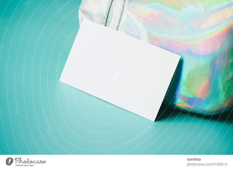 Mockup of a business card with a holographic texture as background iridiscent mockup blank rainbow surface oil creativity art weird crazy different concept