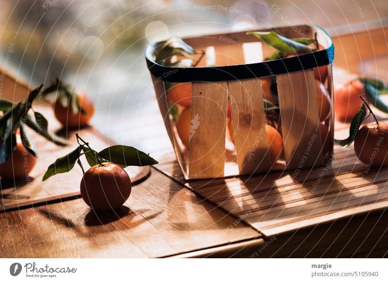A basket with tangerines Basket fruit Chip basket mandarins fruits leaves Light Food Healthy Fruit Healthy Eating Organic produce Vitamin Nutrition Fruity