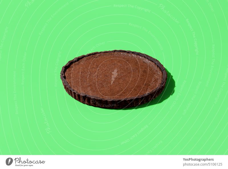 Chocolate tart in bright light isolated on a green background above autumn baked banner black brown cake calories chocolate christmas cocoa coffee color