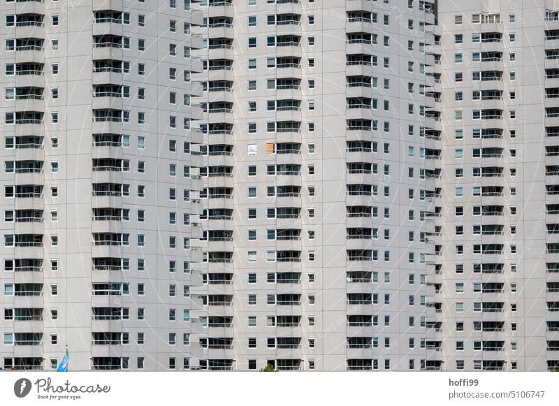 gray high-rise facade with color highlight colour points Apartment Building High-rise anonymity Facade High-rise facade Architecture Arrangement Symmetry