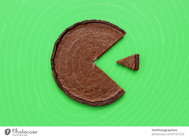 Chocolate tart top view on a green background. Pie chart concept baked banner black brown business cake calories chocolate circle cocoa color copy space crust