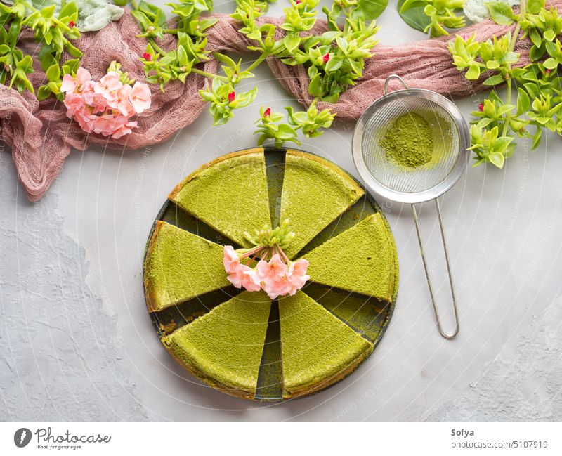 Matcha cheese cake and flowers matcha green tea dessert food sweet cream bakery gourmet healthy pastry baked tasty decoration delicious homemade plate slice