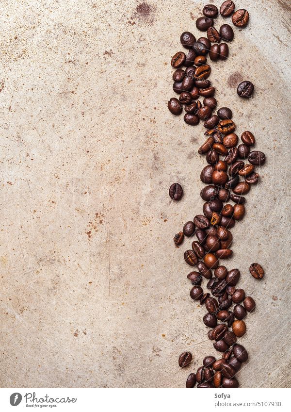 Coffee beans on textured background coffee food rust rusty roasted espresso drink nobody black arabica brown above top view flat lay closeup