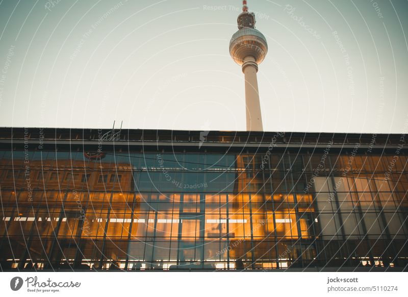 Alexanderplatz station is illuminated by the evening sun Berlin TV Tower Landmark Downtown Berlin Tourist Attraction Capital city Sightseeing City Glas facade