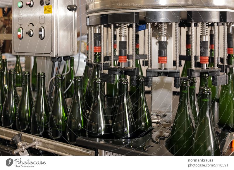 Filling machine Sparkling wine fill champagne bottling Bottle filling machine Beverage Alcoholic drinks Conveyor belt Production Winery Machinery Glass