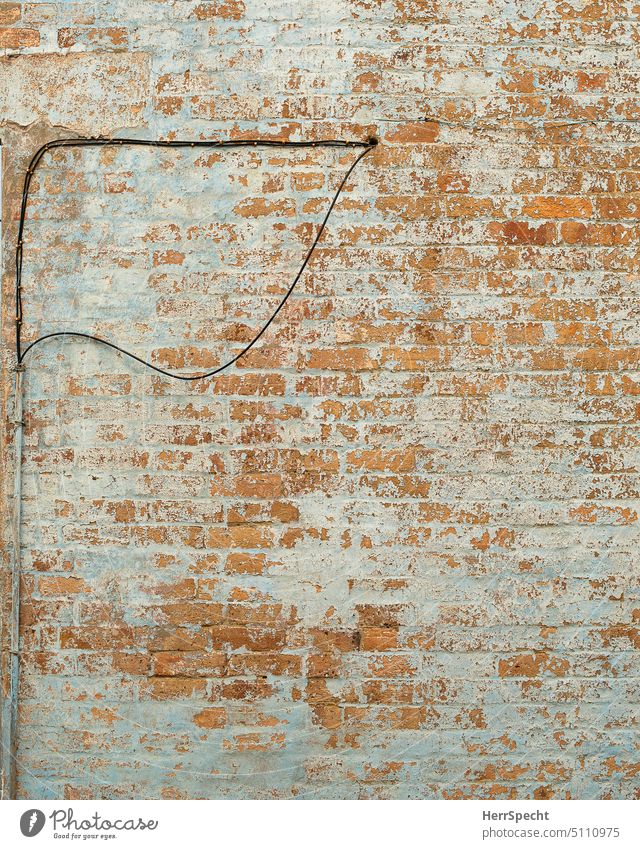 Old house wall with cable chaos Brick wall Wall (barrier) Exterior shot Facade Structures and shapes Brick facade Red Deserted Terminal connector Pattern Detail