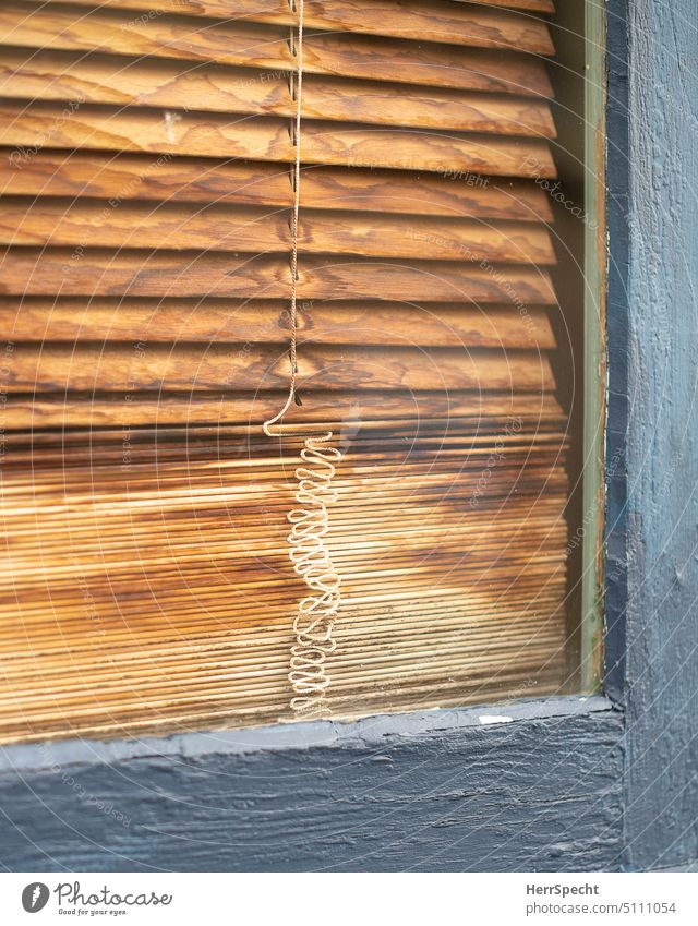 Window detail with old wooden blind Venetian blinds Closed Roller blind Structures and shapes Gray Screening Patina Line Wiggly line Pattern Deserted Stripe