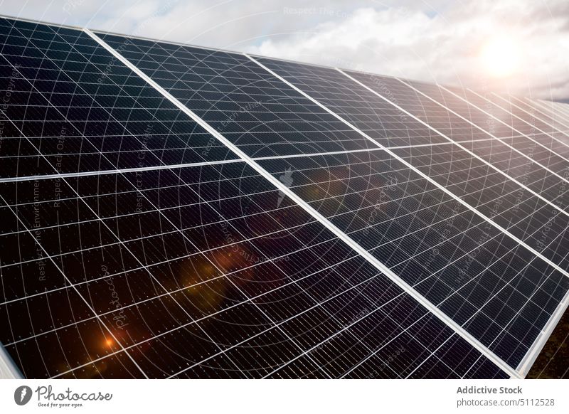Solar panels on power station solar sky reflection shiny sunny daytime energy electricity technology photovoltaic ecology renewable alternative industry
