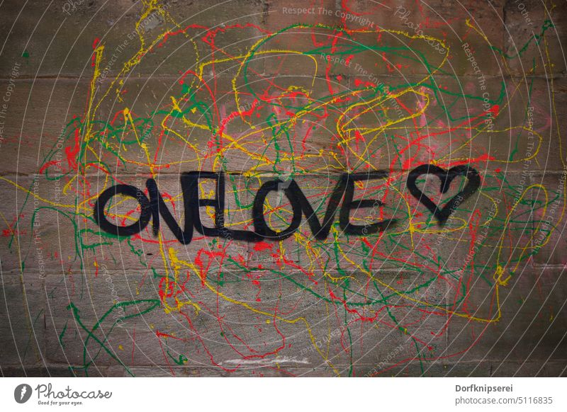 Graffiti One Love with heart Art Wall (barrier) masonry variegated Wall (building) Heart one love illicit color colorful Black Yellow neon Green pink Facade