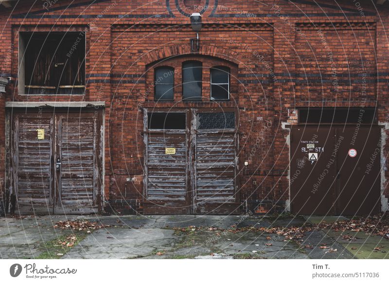 An old farm building in Berlin Garage transformer station Old building Prenzlauer Berg Colour photo Town Downtown Capital city Old town Deserted Exterior shot