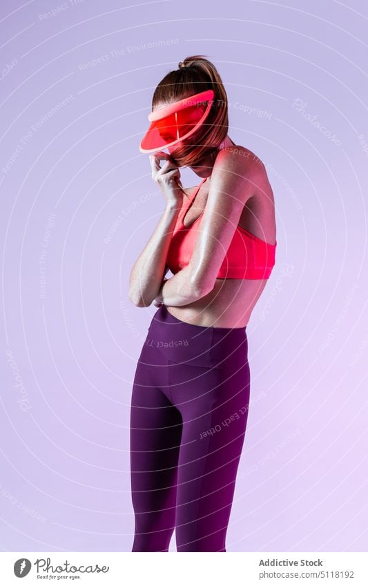 Sportswoman covering face with hair sportswoman cover face ponytail training fitness embrace break sportswear wellbeing female workout activity strength power