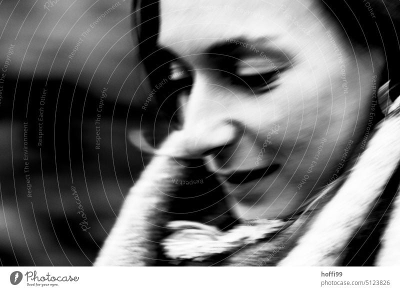 Portrait with movement and averted gaze portrait blurred Ambiguous motion blur ICM Mysterious hazy Abstract vibrating somber Strong strength Self-confident