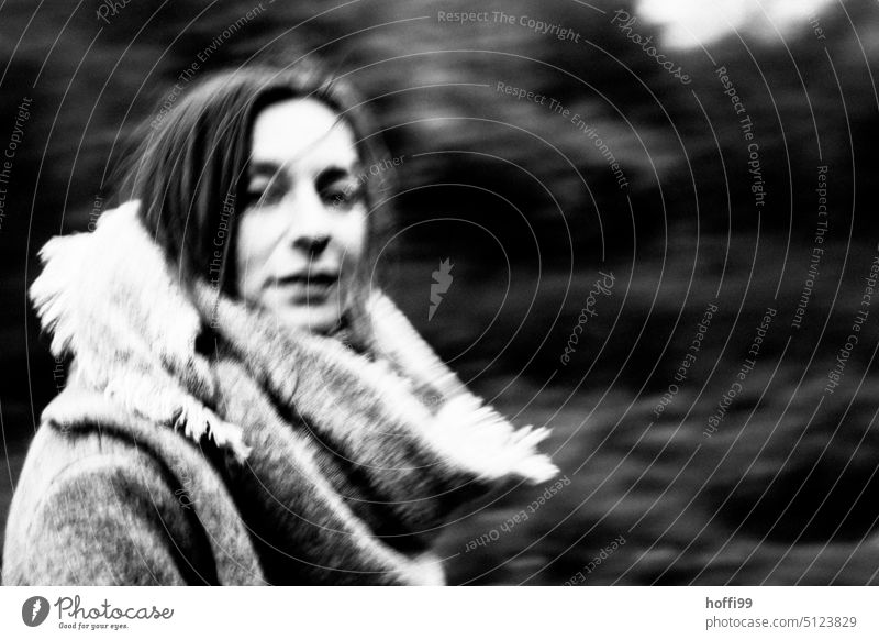 Portrait with movement and confident look into the camera portrait blurred Ambiguous motion blur ICM Mysterious hazy Abstract vibrating Looking into the camera