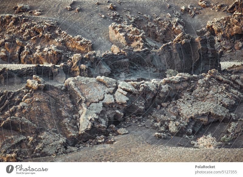 #A0# At the beginning Volcano crater Volcanic Volcanic crater Volcanic island volcanic rock Vulcanism volcanism volcanoes Canaries Lanzarote Landscape mightily