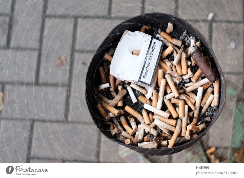 old butts and stubs in ashtrays from above - smoking is deadly Cigarette Ashtray cigarettes tilt Smoking stop Addiction Addictive behavior good prefix