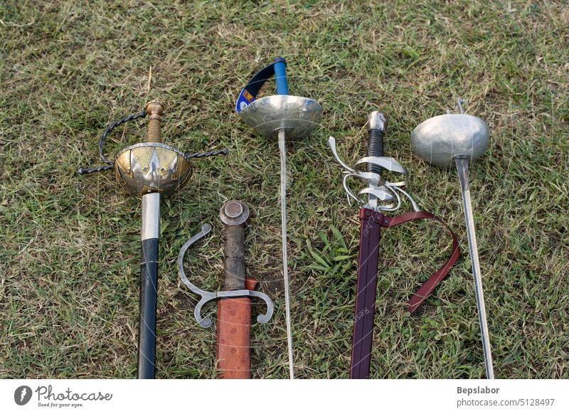 Swords and sabers sword foil military camp Palmanova Historical Reenactment Parade ancient costumes history weapons dress war italy serenissima reenactors