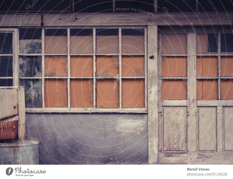 Old workshop facade Workshop door Entrance Wood Orange Gray Weathered Wall (building) Building Facade Exterior shot Gloomy Colour photo Subdued colour