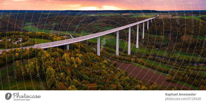 Panoramic aerial view of Kochertal Bridge during sunset in autumn architecture asphalt bridge colorful concrete connection countryside dusk evening forest