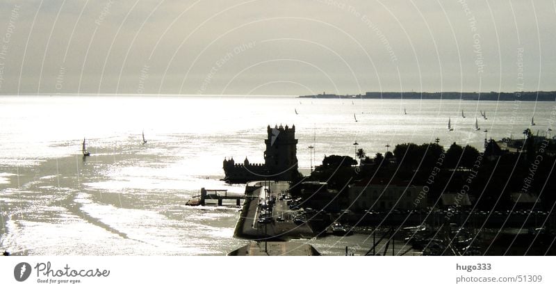 Defense base at the Tejo Lisbon Ocean Watercraft Sailboat Fortress Lake Panorama (View) Tower of Belem River Coast clear vision backlit. Large Panorama (Format)