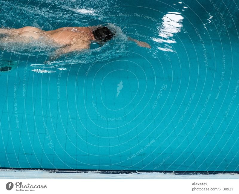 OLYMPUS DIGITAL CAMERA man swim swimming blue swimmingpoll nude butt copyspace