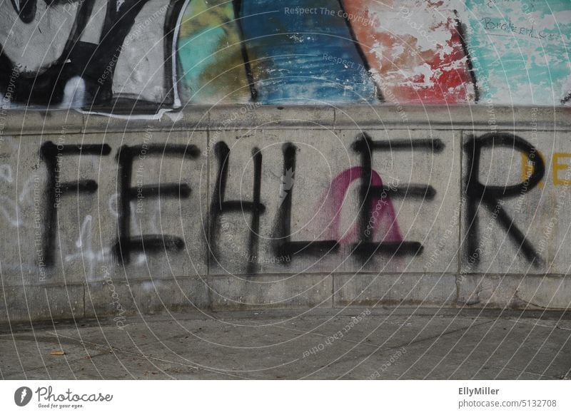 Graffiti inscription: Error. Wall (building) Characters Wall (barrier) Exterior shot Facade Colour photo Deserted Word Daub Street art Text Letters (alphabet)