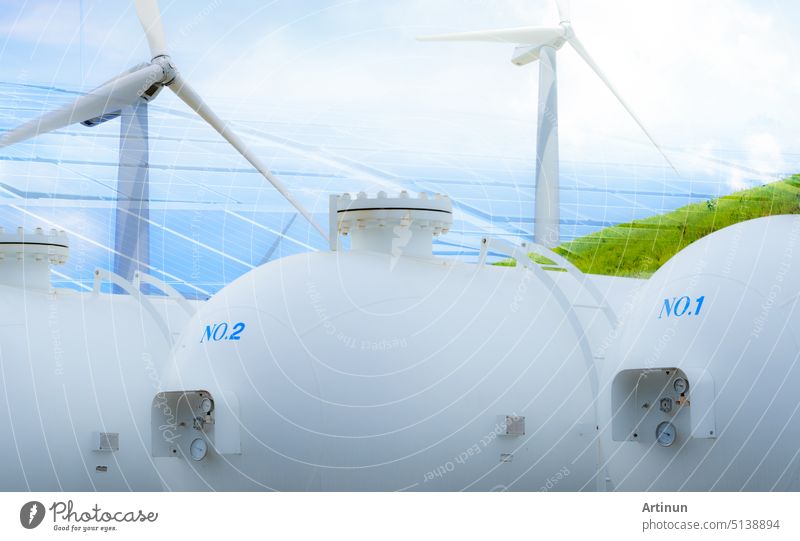 H2 fuel storage tank with green hydrogen concept. Sustainable renewable energy. Net zero emissions by 2050. Solar panel and wind turbine generate electricity for hydrogen gas production. Clean energy.