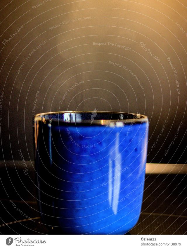 Blue cup with steaming water Cup Beverage Hot Interior shot Drinking Hot drink Coffee Colour photo Food Coffee cup Deserted Delicious Close-up Nutrition Grog