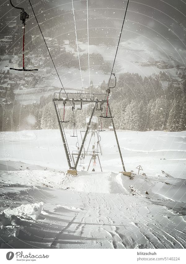 Ski lift with sunshine and snowfall Winter Skiing Tourism Ski resort bpgellift Winter sports Snow Mountain Vacation & Travel Ski run Winter vacation Sports Alps