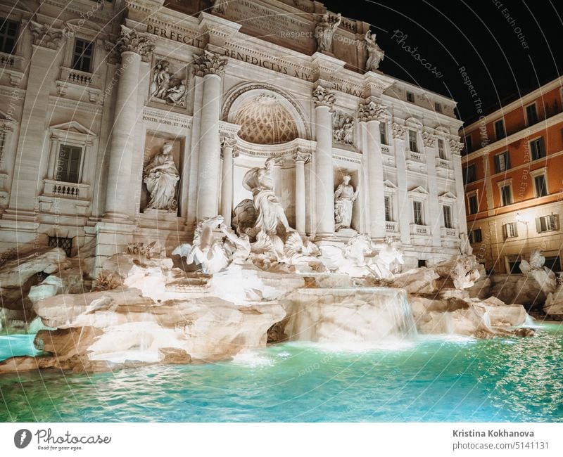 Night at Trevi Fountain with illumination, most famous fountain in Rome, Italy. trevi art baroque italian italy monument neptune roma rome sculpture statue