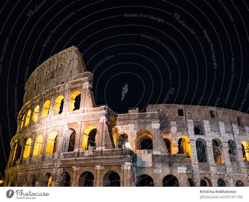 Roman colosseo by night. Ancient colosseum on black sky background. beach travel sea holiday ocean vacation aerial summer water blue landscape nature sun
