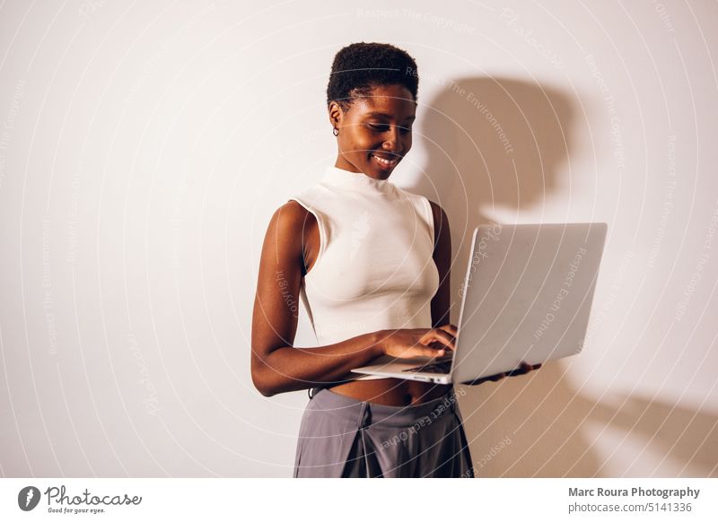 black woman person using laptop adult african woman attractive background beautiful business businessperson businesswoman cheerful computer confident creative