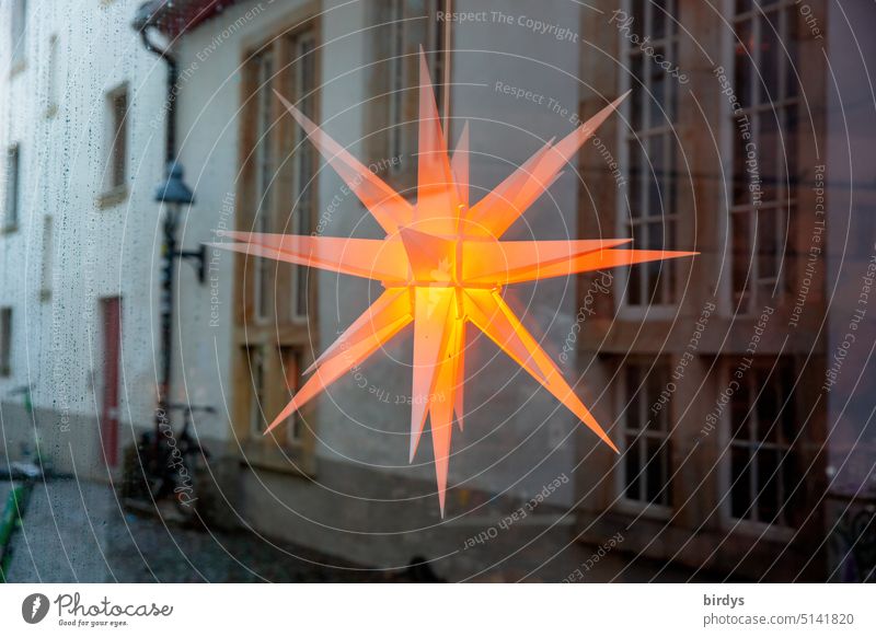 three-dimensional , orange glowing star in a reflecting shop window Stars Christmas star Decoration Three-dimensional Shop window reflection urban Town