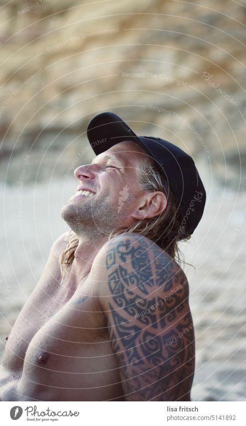 CLOSE YOUR EYES - ENJOY - ON THE BEACH Man 30-35 years Upper body free Summer Cap Adults Colour photo Beach Summer vacation Summery wet hair eyes closed