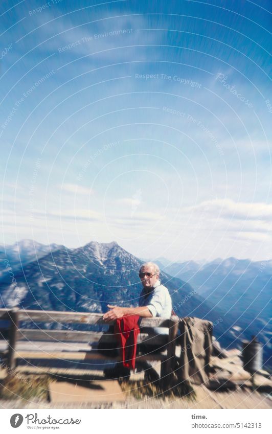 close to nature | hiking break Man mountains Mountain range bench Hiking Summer panorama travel Beautiful weather Sky Sit 1970s Looking into the camera look