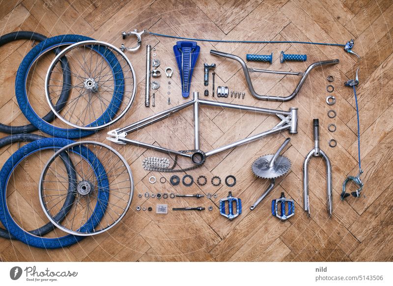 Oldschool BMX is restored, flatlay of the whole bike in its parts. BMX bike Bicycle cycling vintage 80s singlespeed Restoration Colour photo Tire Bicycle tyre
