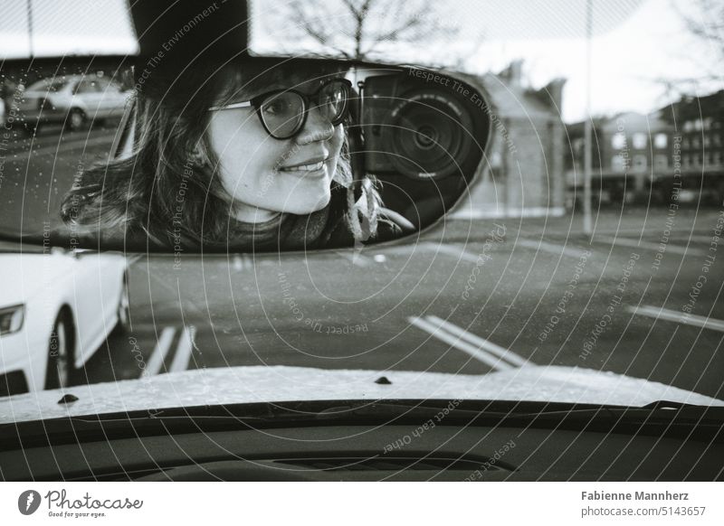Looking back with a smile Mirror Rear view mirror car mirrors camera Photography Camera photographer Eyeglasses Person wearing glasses Young woman Smiling kind