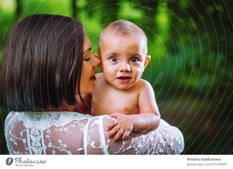 Mother And Her Son On Summer Walk In Forest. Little Baby Smiling And Enjoying. adult autumn baby background boy caucasian cheerful child cute emotion enjoy