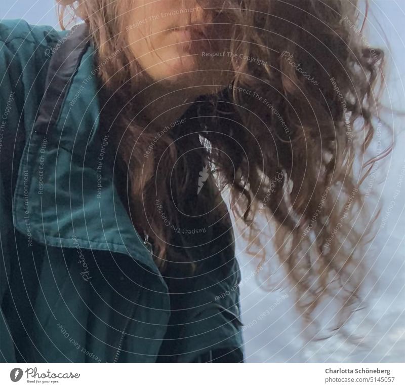 flying hair in the wind Nature Storm Clouds outside blurriness Blue Sky Day Weather Colour photo Curly Hair Green Woman Human being Bad weather long hairs