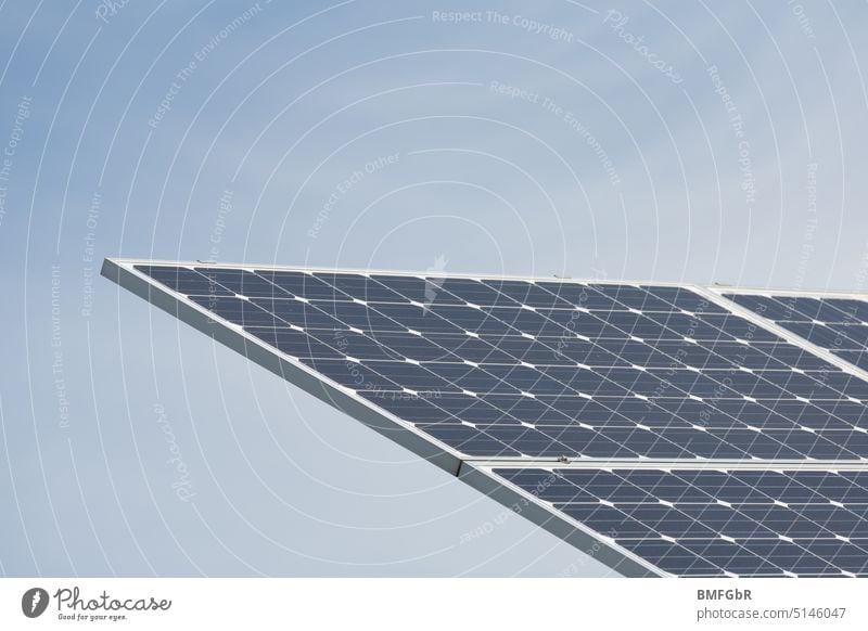A part of a solar cell in front of cloudy sky Renewable energy Energy generation photovoltaic system Climate change Energy industry energy revolution
