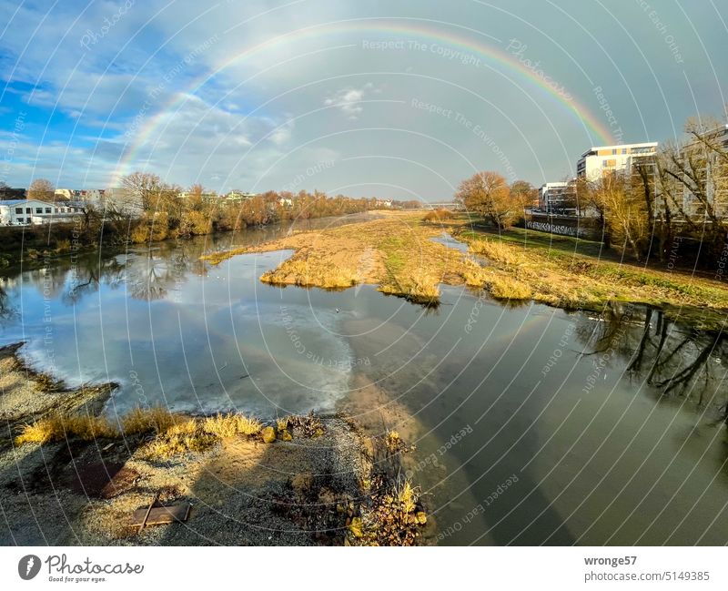 In full splendour Rainbow Secondary rainbow downpour old Elbe Riverbed Sandbanks Exterior shot Colour photo Deserted Day Wide angle Town Reflection in the water