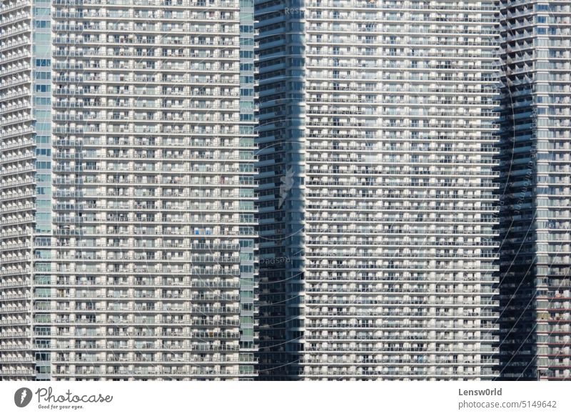 Dense urban living in skyscrapers in Tokyo, Japan tokyo city building dense population exterior balcony Overpopulated density Tall