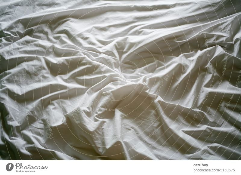 Messy white sheet on bed background textile abstract wrinkled crumpled design pattern texture bedroom soft bedding messy silk fabric linen backdrop bright