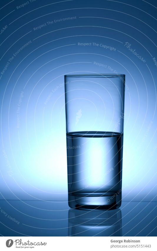 Is you glass half full or half empty? psychology psychological glass of water water glass waterglass glasses of water waterglasses water glasses blue bluish