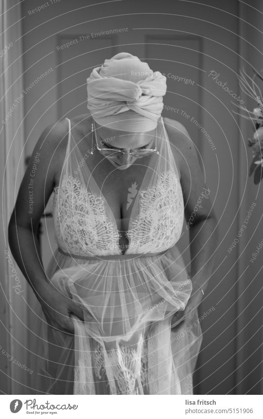 PREGNANT - BRIDE - BLACK AND WHITE Woman Headwear Headscarf Bride Wedding dress Eyeglasses looking down Feminine Adults Young woman Happy Breasts pregnancy