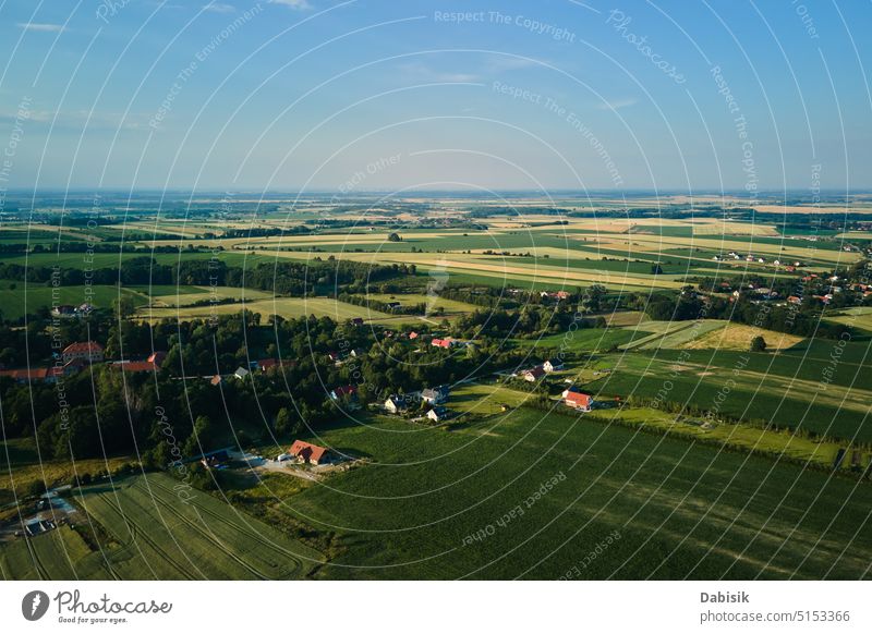 Aerial view of countryside area with village and mountains overhead poland landscape rural aerial valley agriculture environment field forest green hill nature