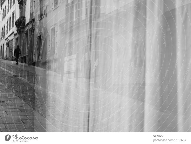 Shop window reflection Town Drape Human being Street row of houses Going Black & white photo Exterior shot Pedestrian Day one Lonely City life lines Vertical